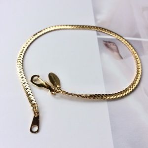 FREE with any purchase - Gold tone herringbone bracelet